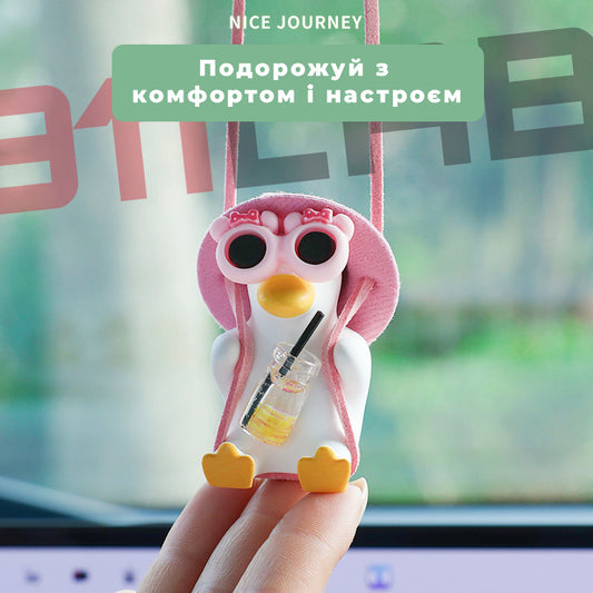 Підвісна качка з окулярами аксесуар для авто