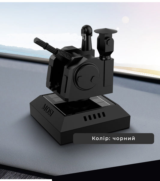 Декоративний аксесуар для авто у формі зенітної турелі з обертовим механізмом на сонячній батареї